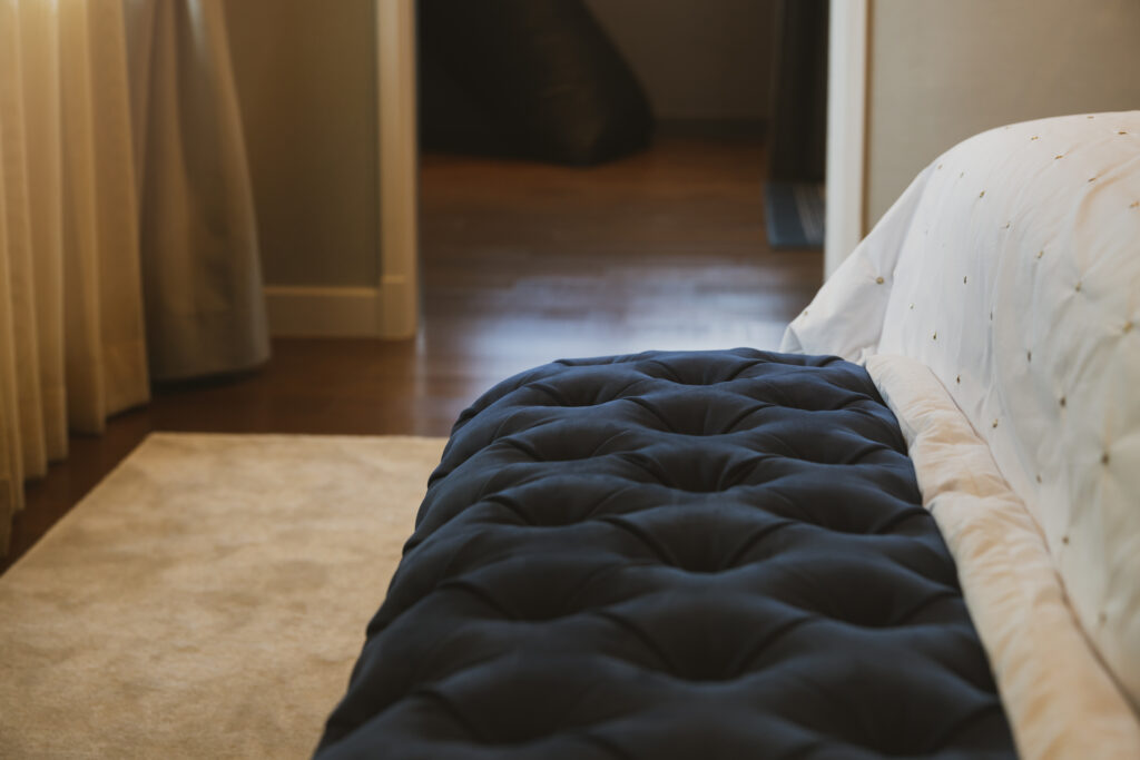close up soft bed blanket fur carpet rug near window bedroom