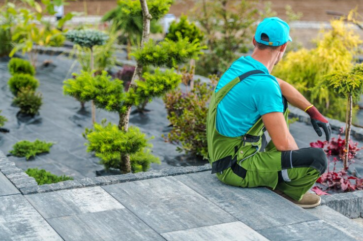 Premium Photo Photo gardener resting after completing his job